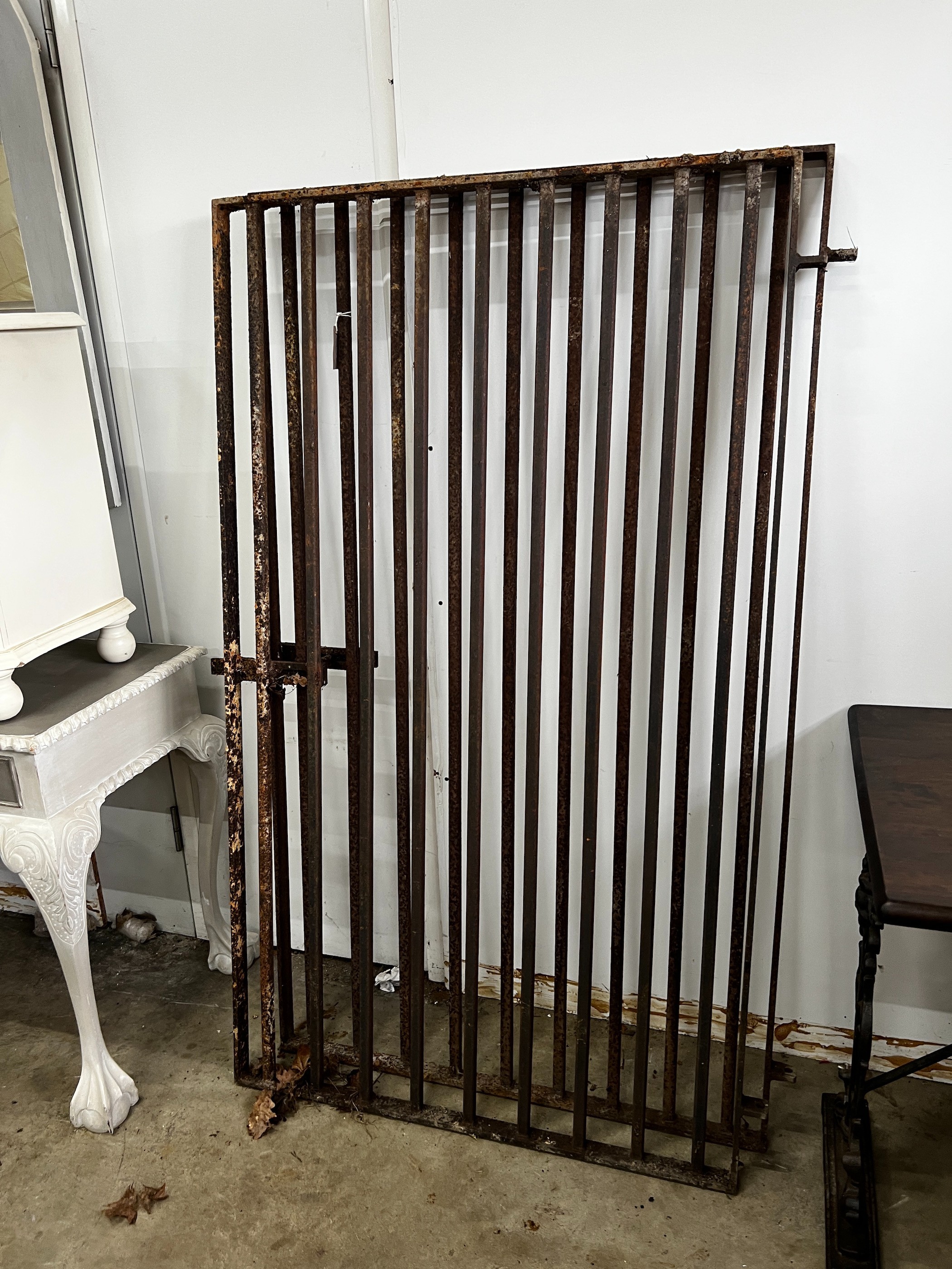 A pair of wrought iron garden gates, each gate width 93cm, height 160cm *Please note the sale commences at 9am.